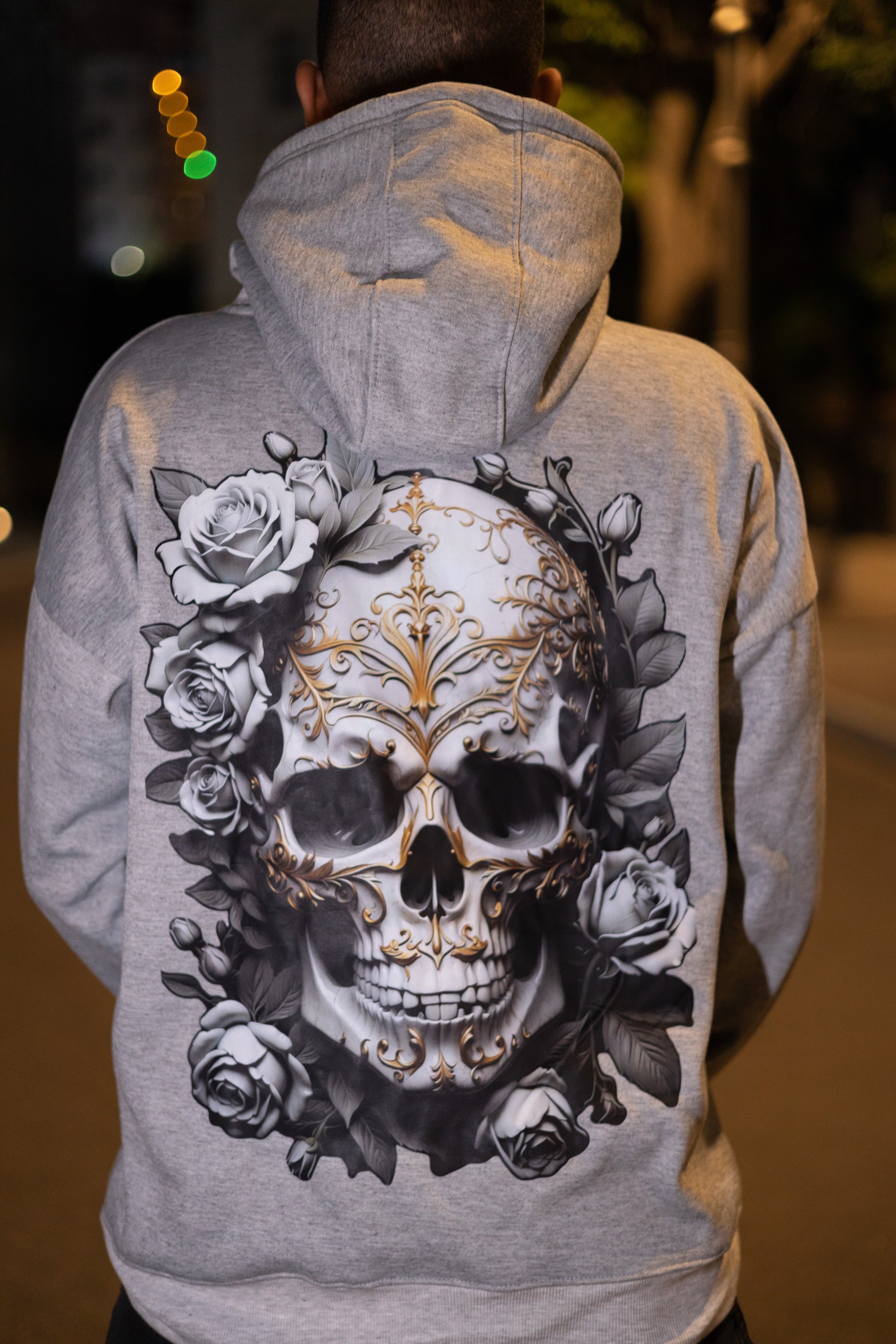 Grey oversized hoodie featuring dark yet beautiful contrast of floral dead skull back print with subtle reflective ChillO logo on front chest.